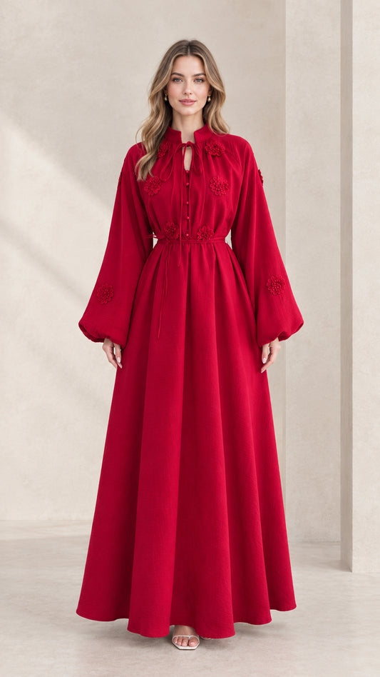 Front view of model wearing a crimson red embroidered lantern sleeve maxi dress