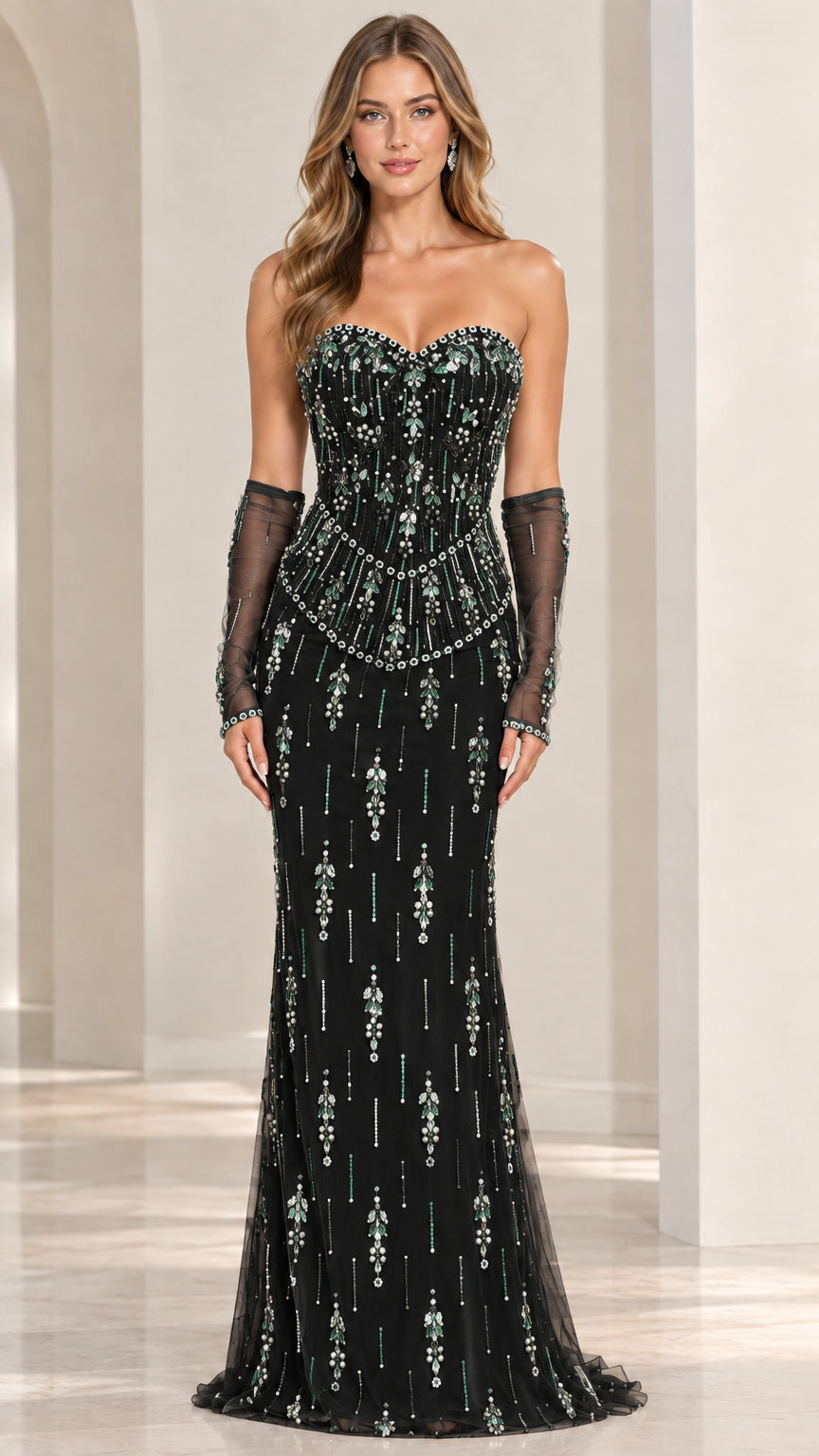 Front view of model wearing black strapless beaded evening gown with sheer opera gloves